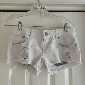 Juniors white ripped shorts
